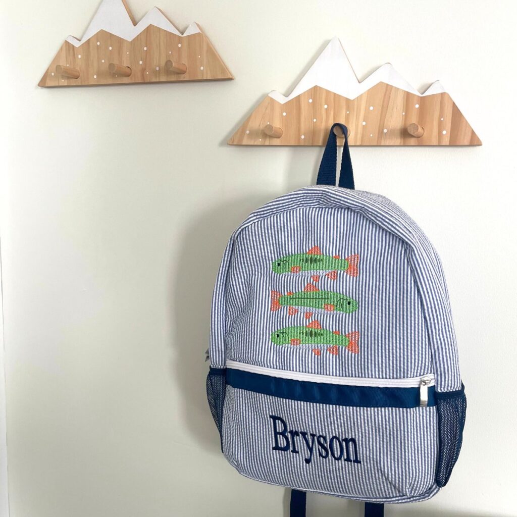 Picture of mountain hooks and fish book bag in a Woodland nursery