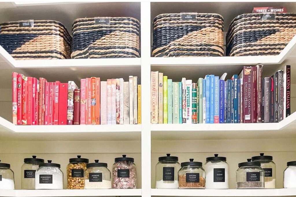 Kitchen Pantry with books sorted by color and pantry staples in jars