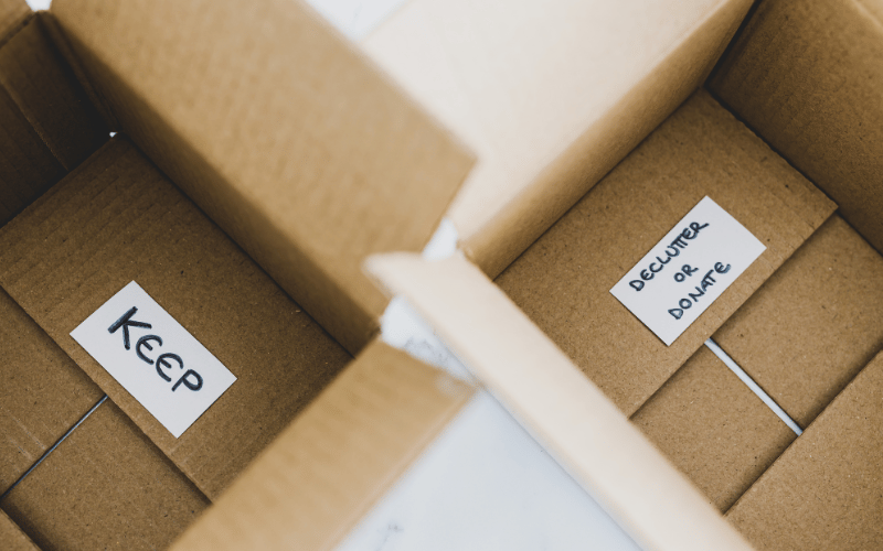 Decluttering boxes that say keep and donate
