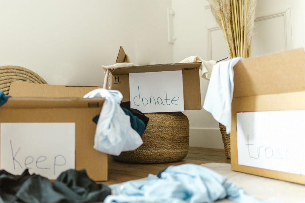 Items sorted by donate, keep, and trash