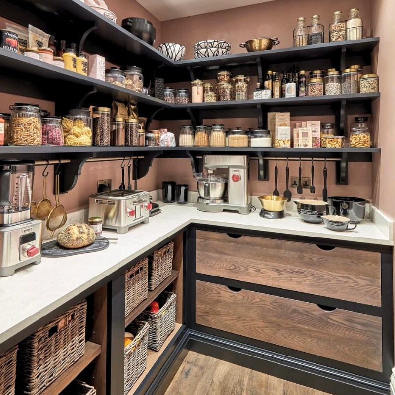 Large walk in pantry that's organized as a mini kitchen.