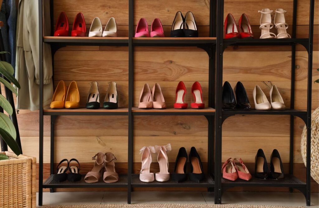 Shoes stored on a bookshelf