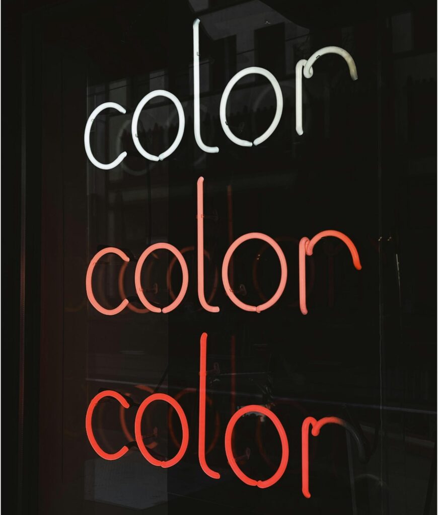Neon sign that says color, color, color 
