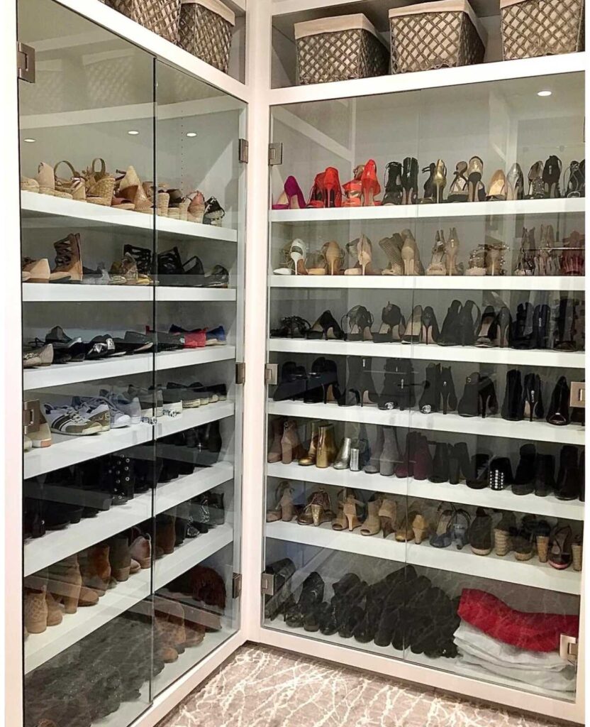 Storage ideas for closets: Shoes organized on shelves in glass case
