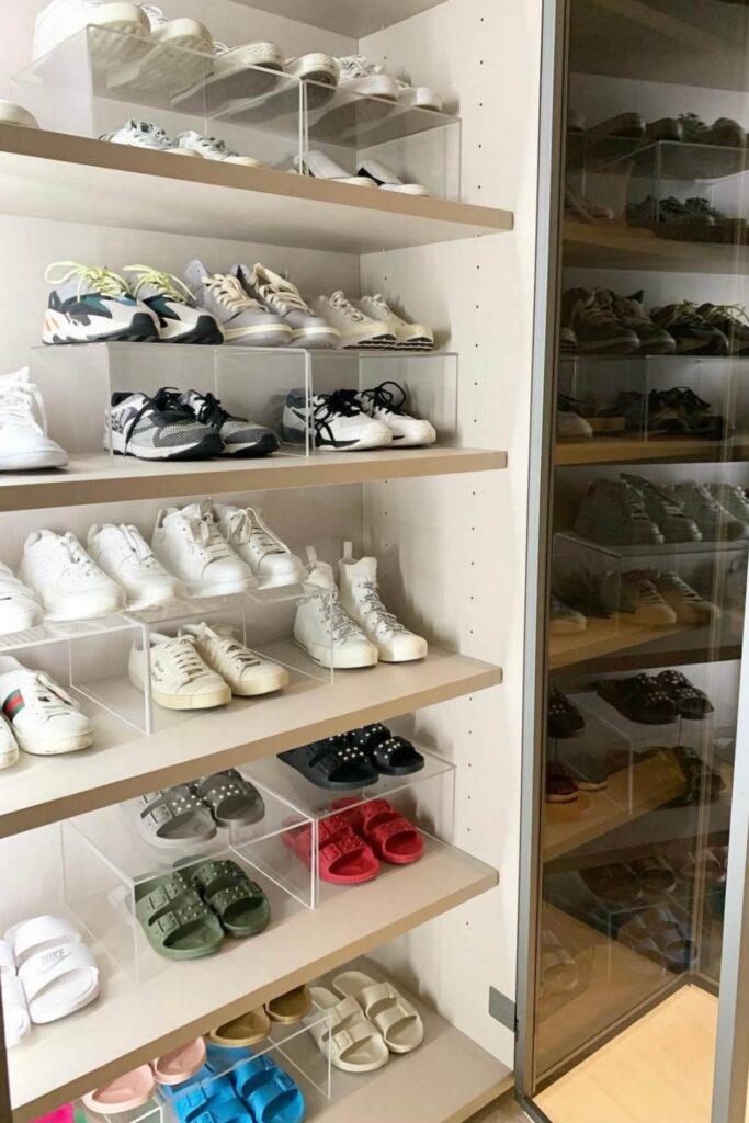 Shoes on a shelf organized with risers