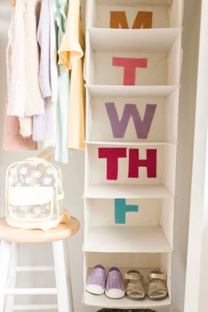 Hanging closet organizer from Monday to Friday in a closet. 
