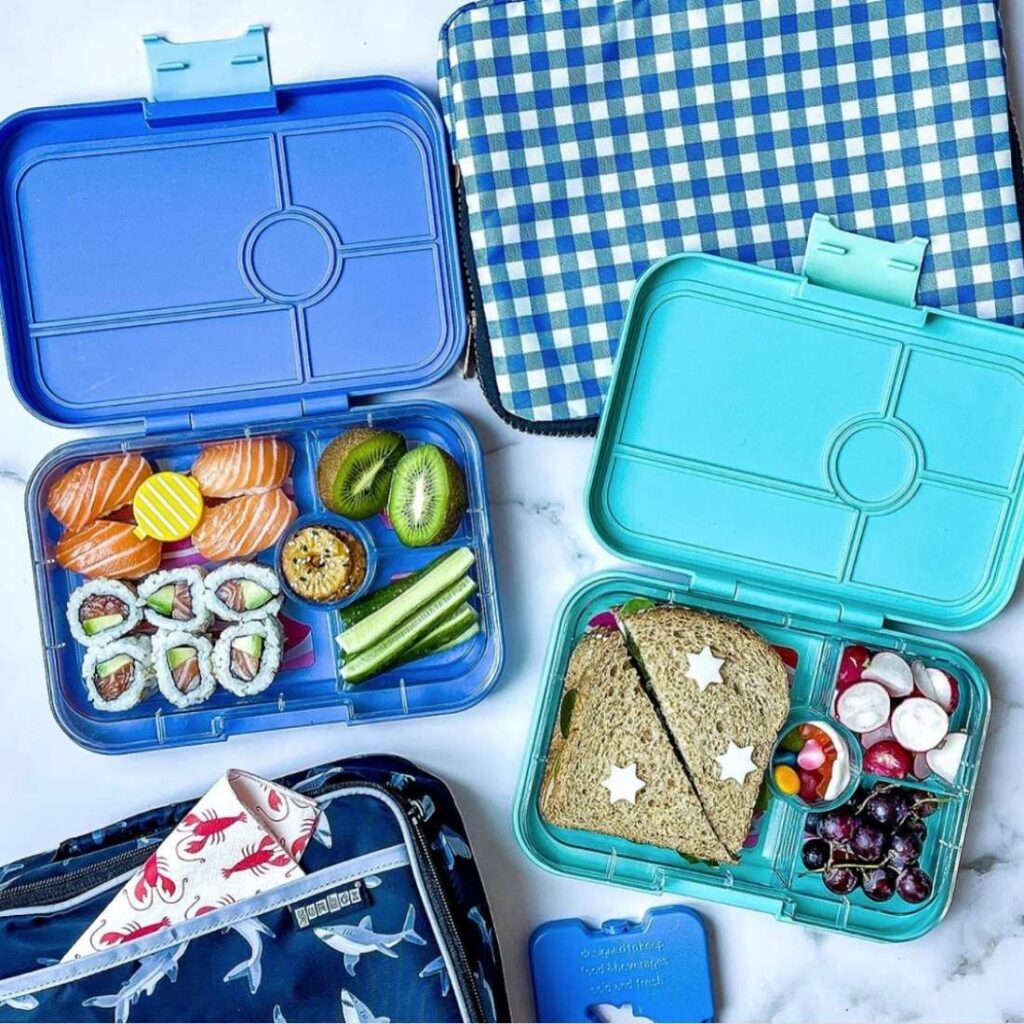 Picture of lunchboxes with food inside them