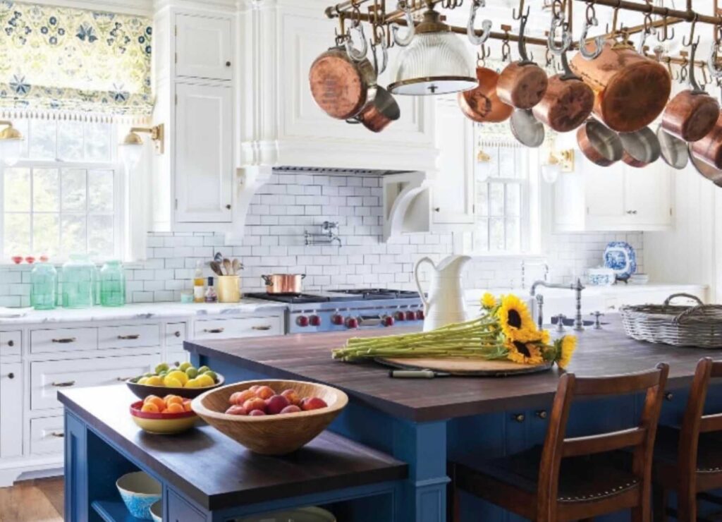 Pots and pans hanging on a ceiling rack
