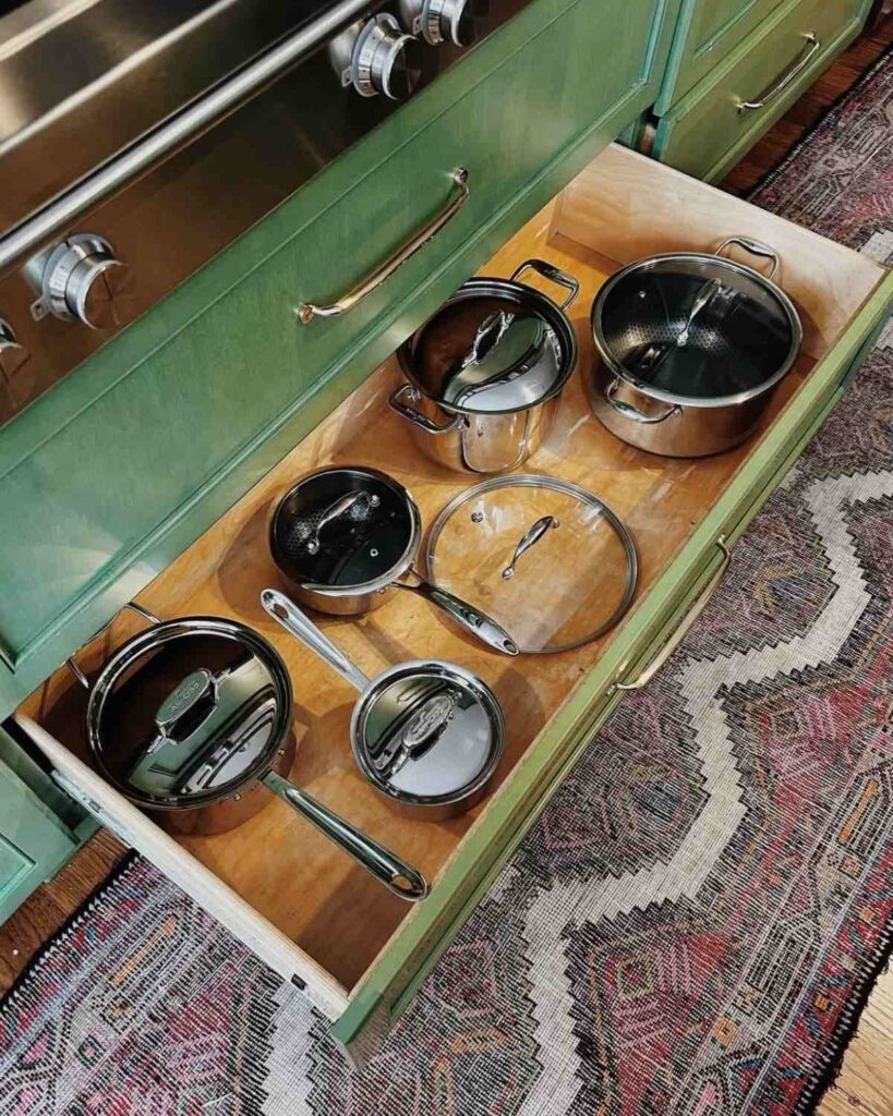 Pots organized neatly in a drawer