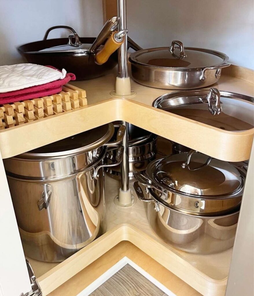 Pots and Pans organized in kitchen lazy susan