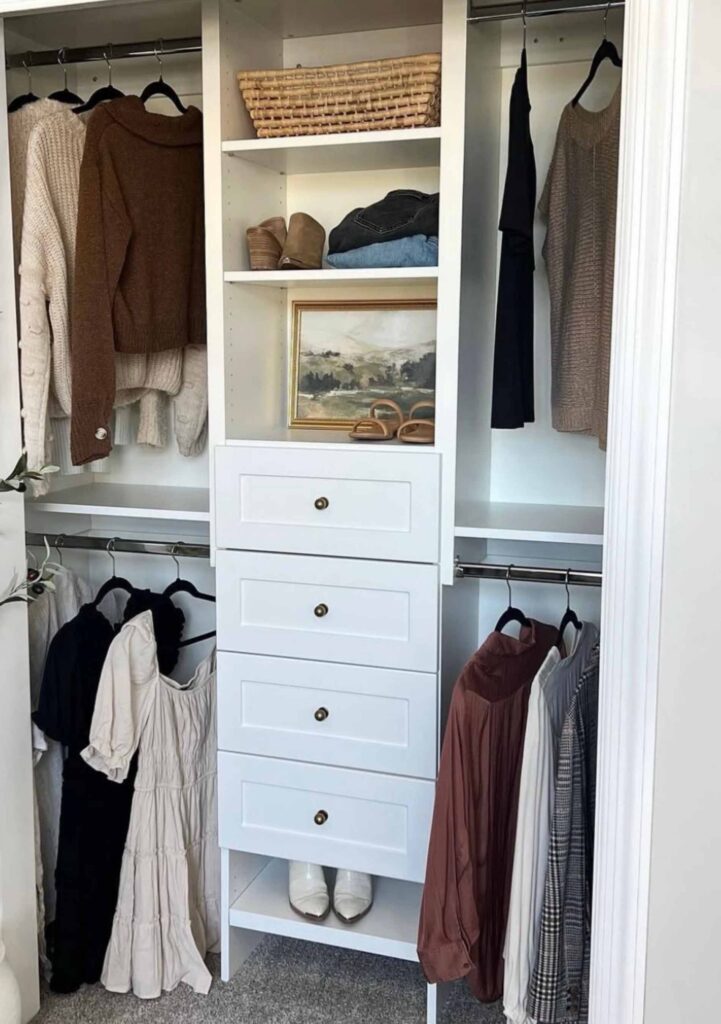Photo of a small closet with built in storage to maximize space. 