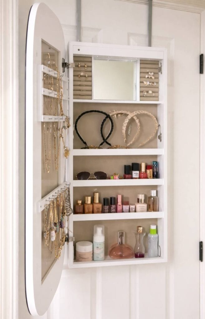 Bedroom mirror jewelry cabinet behind closet door